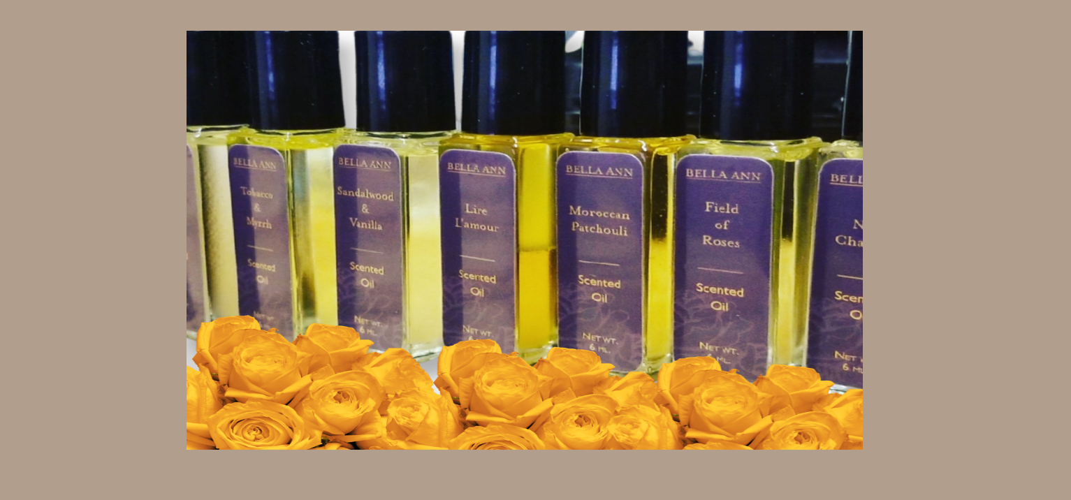 Simply Bella our original scented oil surrounded by yellow roses
