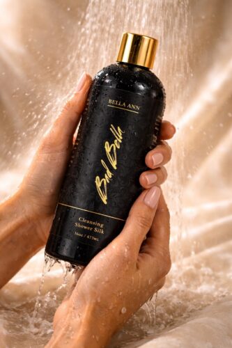 Shower Silk with hands holding bottle and water. How to Smell Like Money with Bella Ann Shower Silk