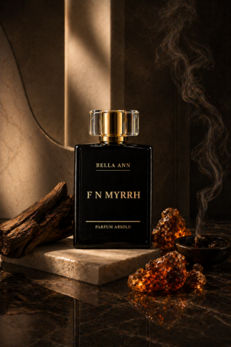 F N Myrrh in a dark background with smoke. F N Myrrh bold luxury fragrance